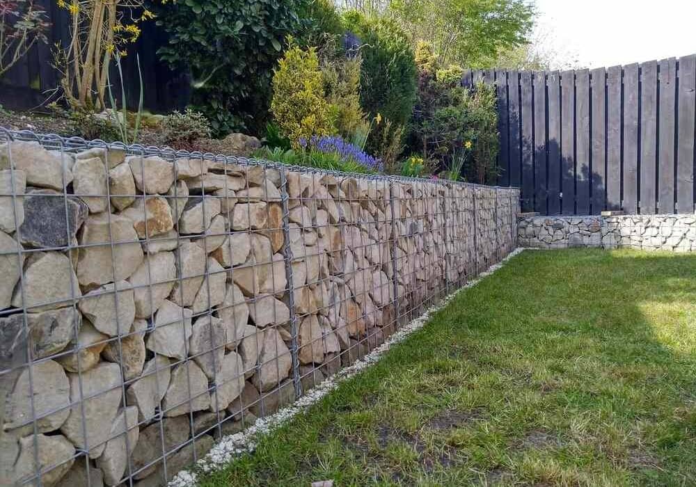 Gabion Wall in Backyard with grass in Denver by Denver Retaining Wall Pros